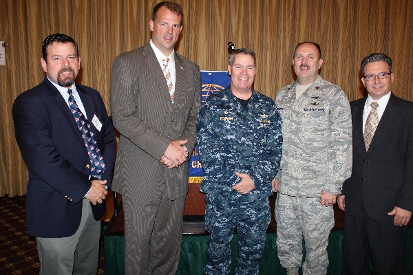 AFCEA and joint service representatives at the May meeting are (l-r) Rob Corey, chapter senior vice president; U.S. Rep. Jon Runyan (R-NJ); Capt. Jay Bowman, USN; Maj. Doug Steinert, USAF; and Charles Maraldo, director, U.S. Army Communications-Electronics Research, Development and Engineering Center Flight Activity.
